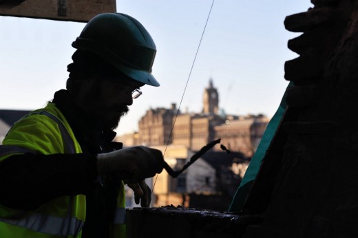 Professional carrying out maintenance on property - Edinburgh World Heritage Guidance