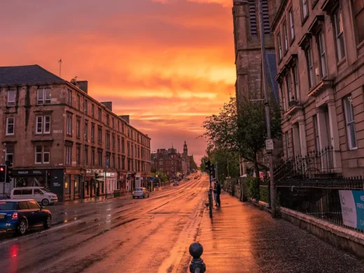 Smart façades integrating technology in buildings - city street sunset